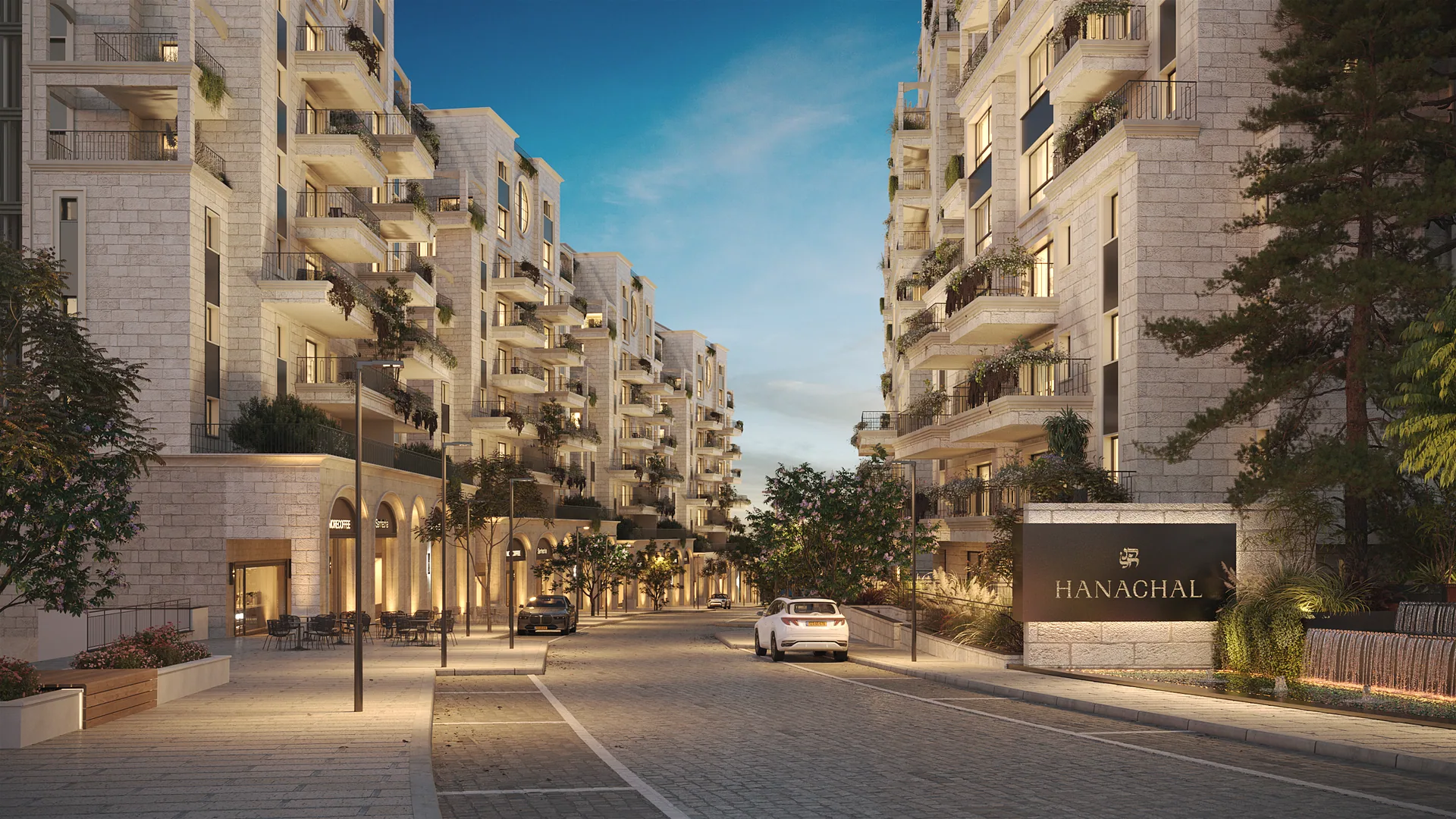 Stone-clad Hanachal residences opening onto a landscaped community street